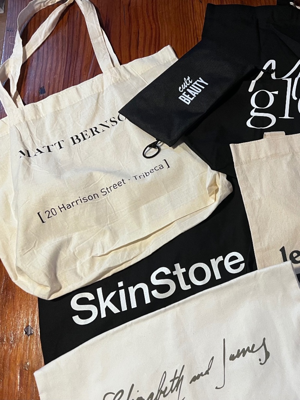 Mixed lot of 8 fabric totes, shoe and misc branded bags